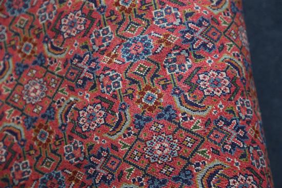 A Persian runner, 20ft 10in. x 2ft 6in.